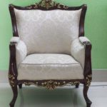 white and brown floral armchair